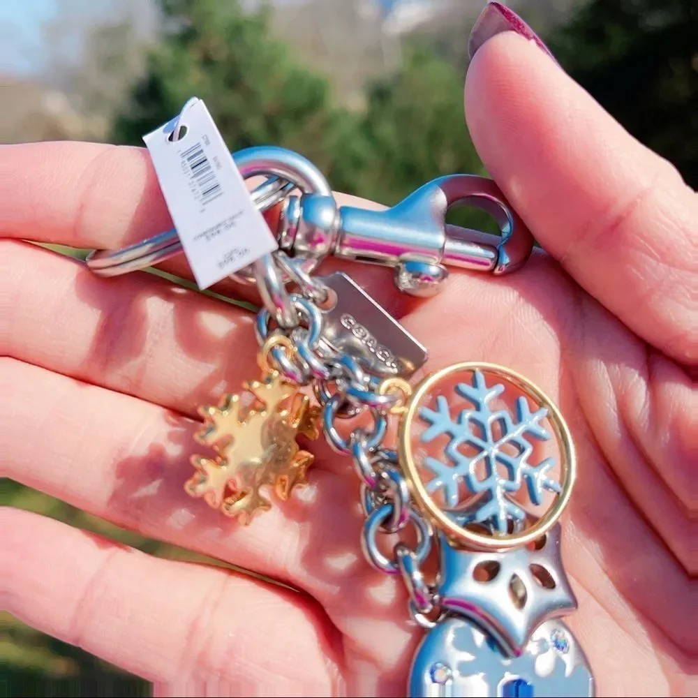 Authentic COACH Enamel & Metal snowflake 5